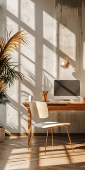 A computer desk with a chair and a computer monitor. The desk is in a room with a window that lets in sunlight