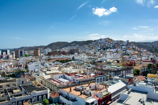 Panoramic top view of the capital Las Palmas Gran Canaria in Spain with blue sky