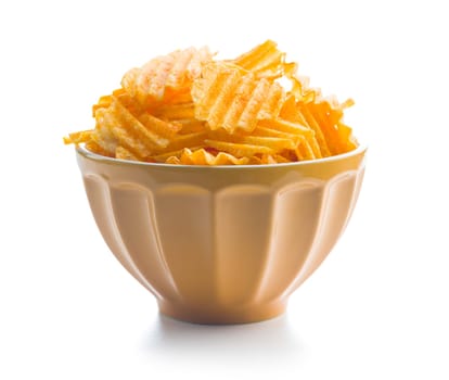 Crispy potato chips in bowl  isolated on a white background.