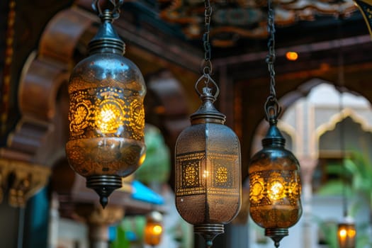 Gilded Islamic lanterns with filigree patterns, creating a warm and inviting atmosphere.