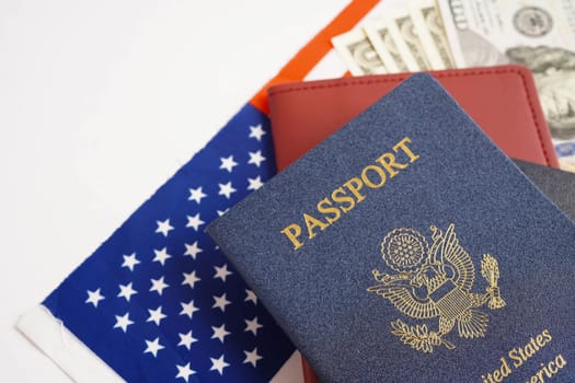 US passport issued to citizen and national of the United States of America to travel in most countries outside with USA flag and dollar money.