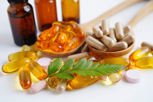 Alternative medicine herbal organic capsule with vitamin E omega 3 fish oil, mineral, drug with herbs leaf natural supplements for healthy good life.