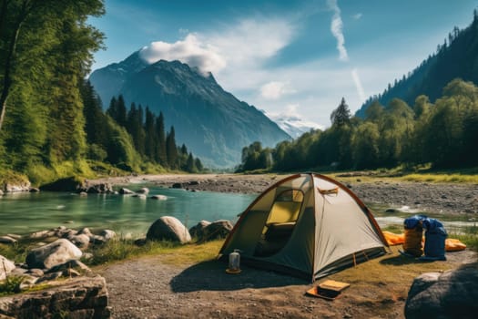 Camping on the bank of mountain river. Hiking in summer to protected areas. Outdoor recreation in tent