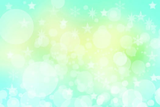 A festive abstract delicate Happy New Year or Christmas background texture with colorful yellow turquoise green blurred bokeh lights and stars. Space for design. Card concept or advertising.