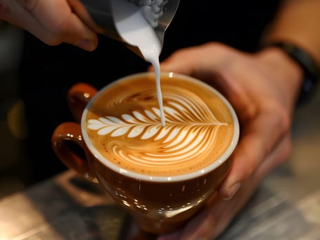 A barista perfection latte art pouring creamy