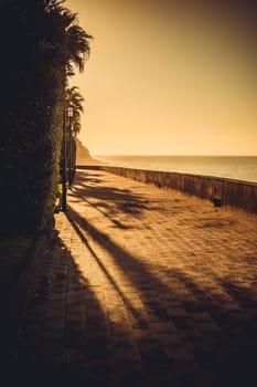 View on ocean promenade in Jadim do Mar, Madeira, Portugal, during sunset