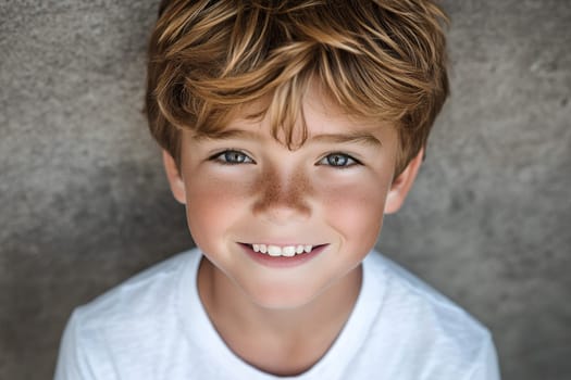 A happy young boy with freckles and a charming smile, radiating innocence and joy.