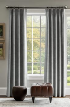 Stylish gray curtains drape elegantly around a large window, letting in bright sunlight and showcasing a lovely outdoor view.