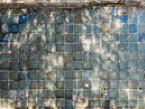 Old glass blocks wall texture, frosted glass brick wall full-frame background