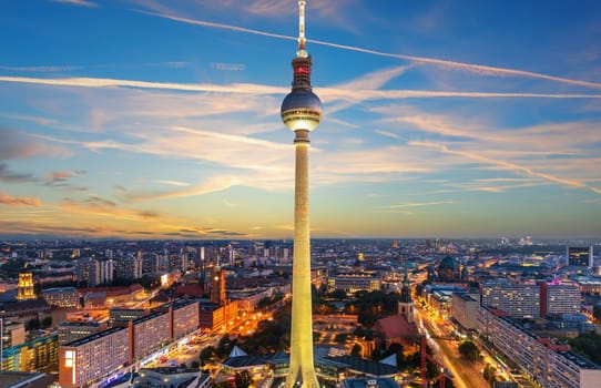 Skyline panorama of Berlin at sunset, modern buildings and bridges, Germany.