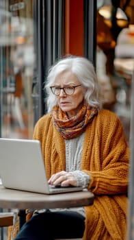 An elderly woman using a laptop computer AI generative.