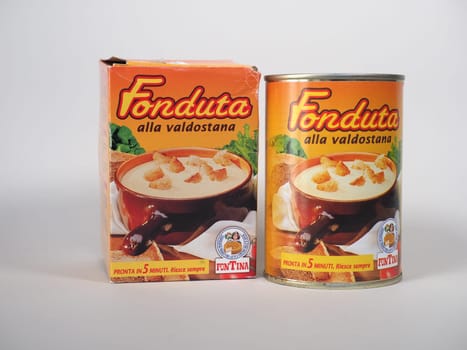 AOSTA, ITALY - NOVEMBER 13, 2024: Fontina Fonduta alla Valdostana fondue melted cheese