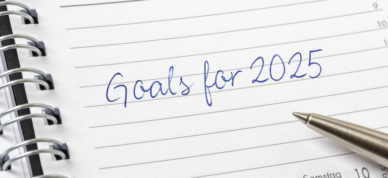 Goals for 2025 written on a calendar page