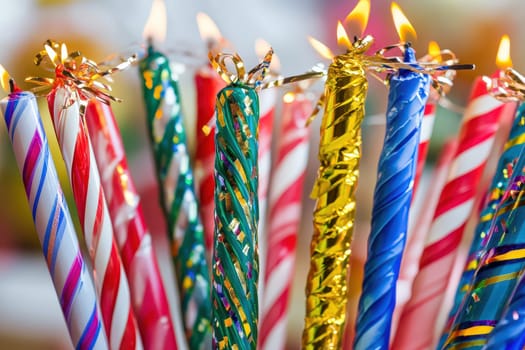 A vibrant collection of birthday candles in various colors stands ready to brighten up a celebration. Perfect for any festive occasion.
