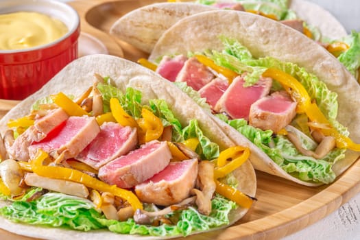 Sizzling Tuna Fajitas with Cheese Sauce