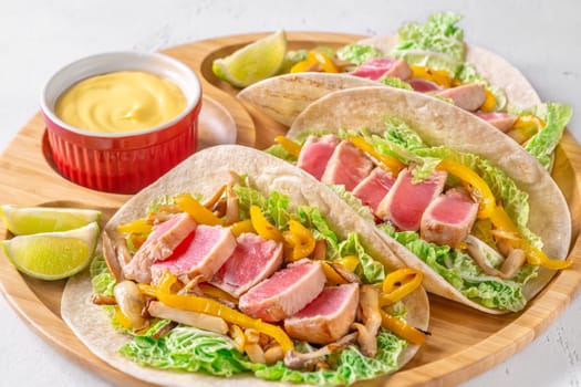 Sizzling Tuna Fajitas with Cheese Sauce