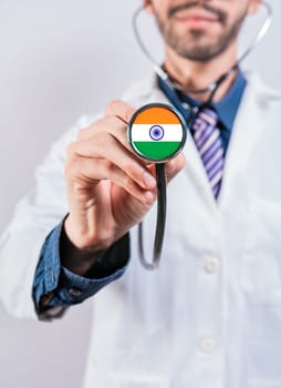 India health and medical insurance concept. Healthcare System India, doctor holding stethoscope