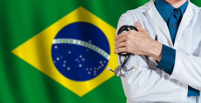 Doctor with stethoscope on Brazil flag. Male Doctor holding stethoscope on Brazilian flag