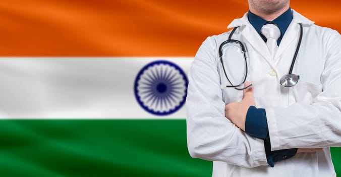 Doctor with stethoscope on India flag. Doctor holding stethoscope on India flag
