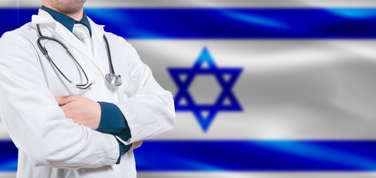 Israel Health and Care concept. Professional doctor on Israel flag. Doctor with crossed arms on Israel flag