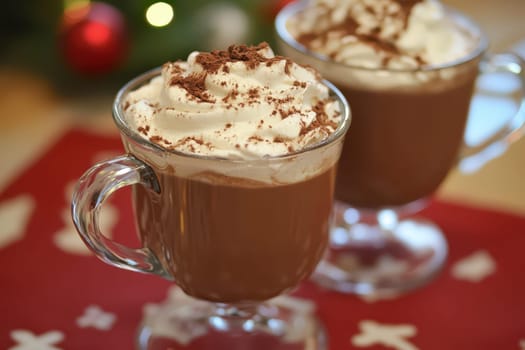 Enjoy warm mugs of hot chocolate topped with whipped cream during the cozy winter holiday season while celebrating with friends.