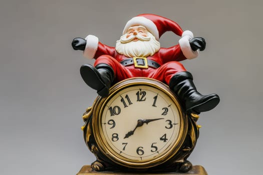 Santa Claus in a red suit joyfully sits atop a vintage clock celebrating the Christmas spirit and holiday time.