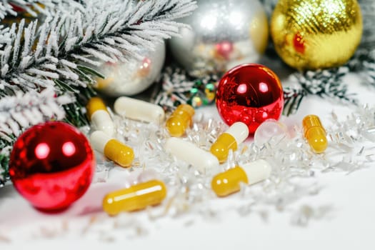 Colorful holiday ornaments surround various capsules on a snowy table creating a unique festive atmosphere during winter celebrations.