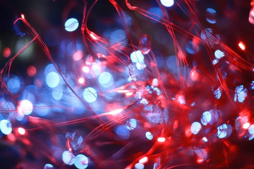 Bright red and blue lights create a mesmerizing display with colorful patterns illuminating the surroundings vibrantly during nighttime.