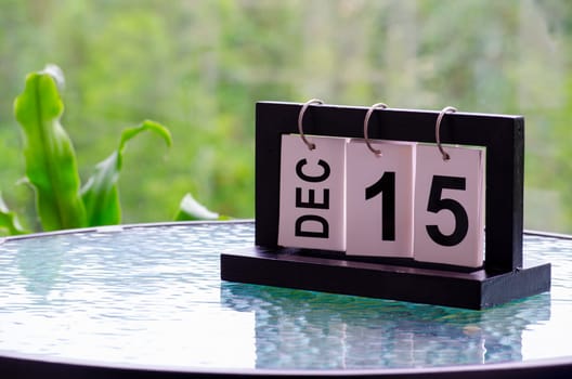 15 December calendar on marble table with customizable space for text. December calendar concept.