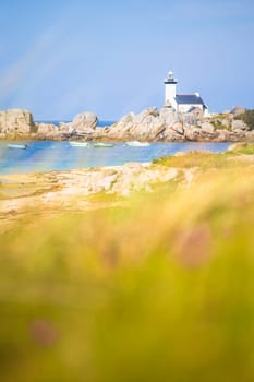 Pontusval lighthouse vertically photographed from the grass in Kerlouan, northern Brittany, France