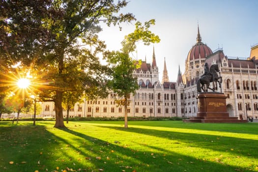 Budapest, Hungary- September 29 2024: The Hungarian Parliament in Budapest viewed from the gardens at sunset, Hungary