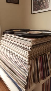 A nostalgic stack of vintage vinyl records in sleeves, capturing the essence of retro music culture.