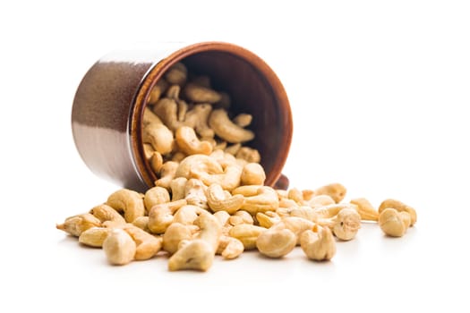 Roasted cashew nuts isolated on a white background.