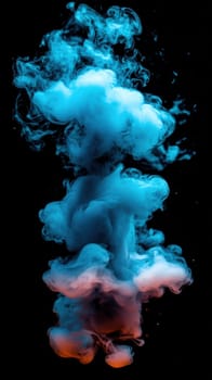 A cloud of vibrant blue and pink smoke swirls and billows against a dark backdrop, creating a captivating visual effect. The thick vapor rises and disperses slowly, enhancing the atmosphere.