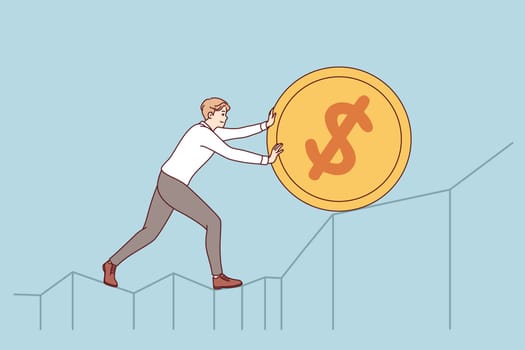 Ambitious man pushes gold coin upward, demonstrating desire to increase income from work or investment. Ambitious investor works to improve financial well-being and generate excess income