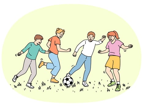 Happy children play football, running on sunny lawn and kicking football ball. Cheerful boys and girls enjoy summer holidays participating in soccer tournament for elementary school students
