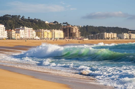 Wave in Atlantic Ocean on the beach in Nazaré, Portugal.