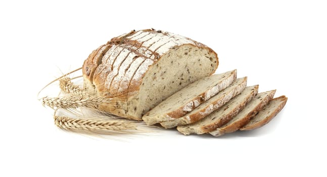 A freshly sliced loaf of rye bread accompanied by wheat ears on a white background. Perfect for concepts of baking, health, nutrition, and traditional homemade food