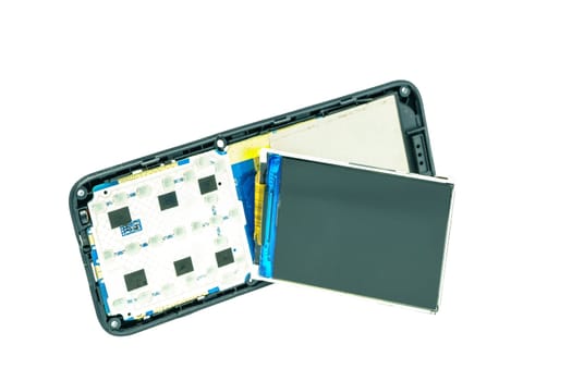 Description: Disassembled old phone revealing internal components, showcasing technology intricate design. Ideal for tech enthusiasts and educational purposes.