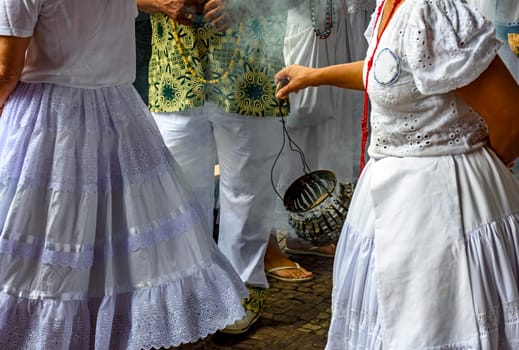 Smoking with burning herbs for spiritual cleansing of people and the common place in Umbanda and Candomble ceremonies in Brazil
