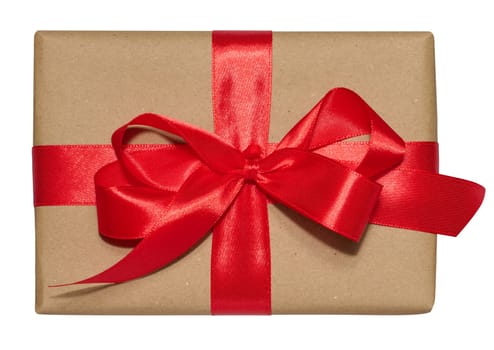 Box is wrapped in brown paper and red ribbon on a white isolated background, top view