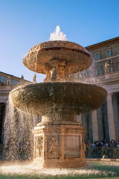 Vatican City, Italy - 18 Oct 2022. Fontane di Piazza San Pietro. One of the fountains of St. Peter’s Square, created by Carlo Maderno and Lorenzo Bernini.