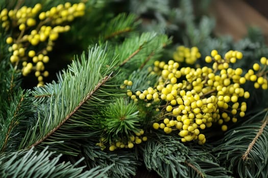Various types of greenery with bright yellow berries create a beautiful and natural arrangement suitable for seasonal decor.