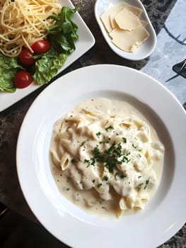 Italian Alfredo Spahetti Pasta. Creamy Penne and spaghetti Food lunch meal
