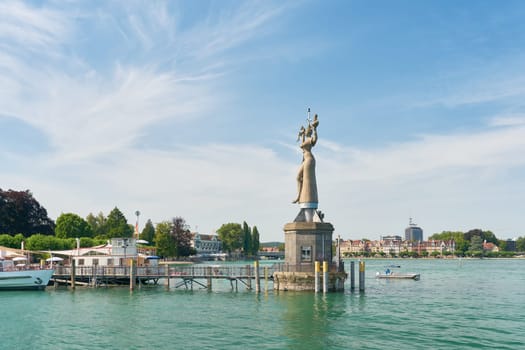 Harbor entrance of the city of Constance on Lake Constance, Bodensee in Germany with the Imperia visible from afar