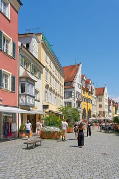 Tourists in a pedestrian zone in the old town in the Insel district of Lindau on Lake Constance, Bodensee
