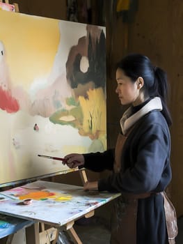 Creative Woman Female Artist Painter. Art Lady Painting a canvas