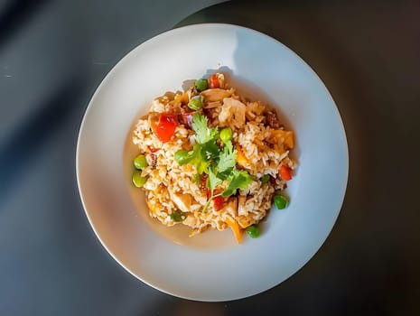 Nasi goreng Fried rice indonesian food dinner dish with vegetables
