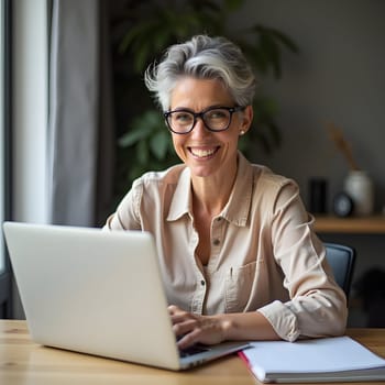 Middle age woman with laptop