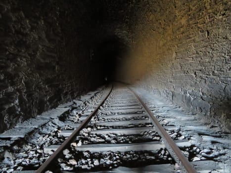 iron road bridges metal rail light at the end of the tunnel train transport